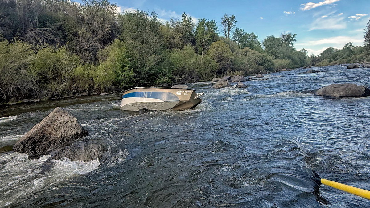 Search and Rescue saves three fishermen after boat capsizes on Fall River