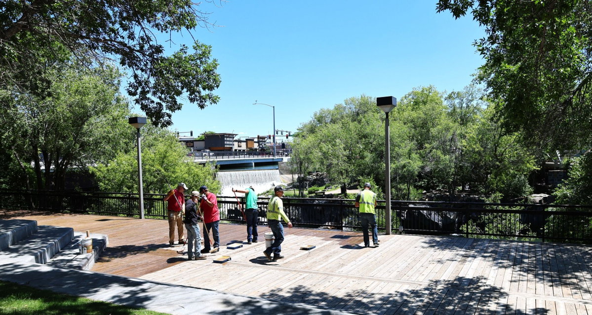 Idaho Falls Power employees volunteer along Riverwalk