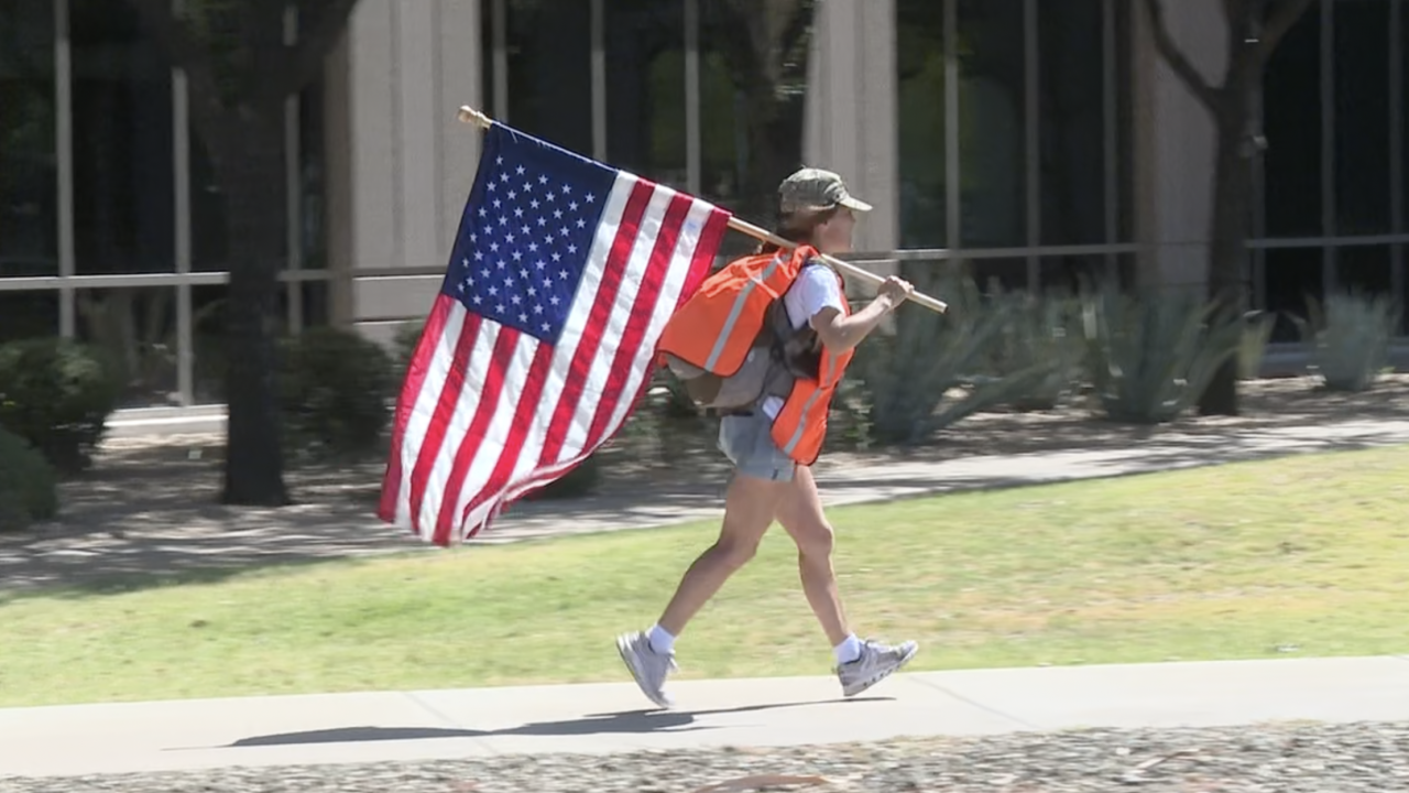A French woman has made it her mission to walk and run across the United States — American flag in hand — as an act of gratitude toward a country of which she is not a citizen.