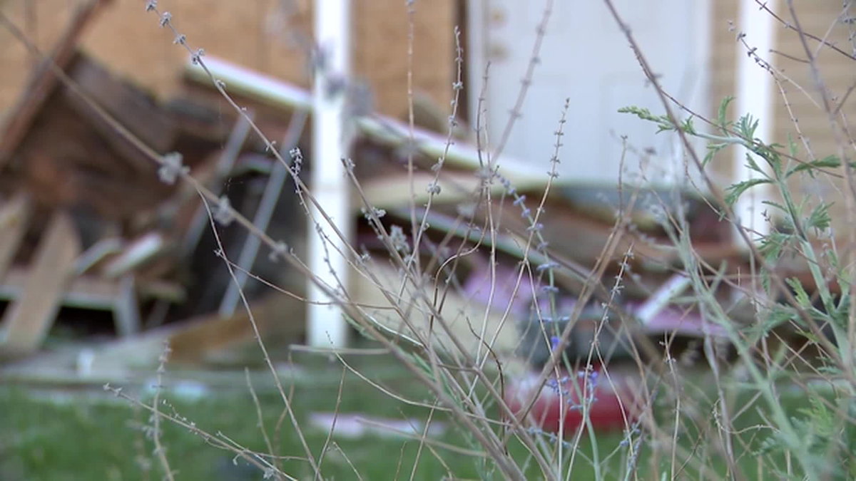 Mother and baby escape serious injury after truck slams into home