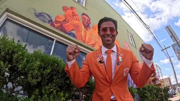 Dutch soccer superfan Daniel Oordt's signature look includes a custom orange suit