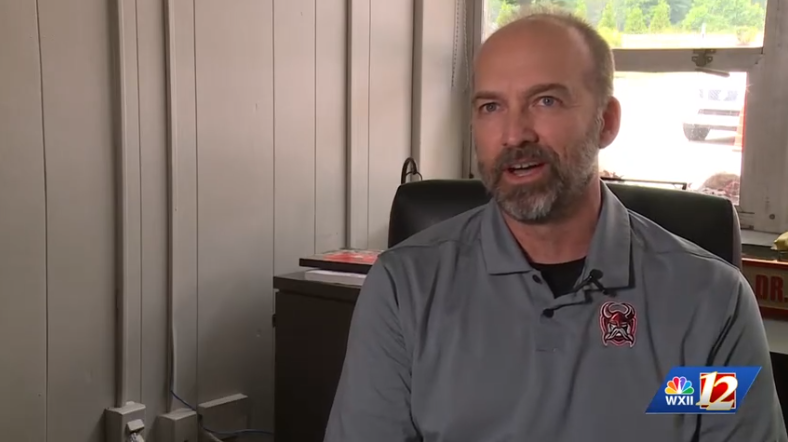 Northwest Guilford High School Principal Dr. Brian Muller got an unusual wake-up call.