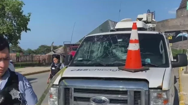 The CBS Chicago van was damaged in the attacked near the Adler Planetarium.
