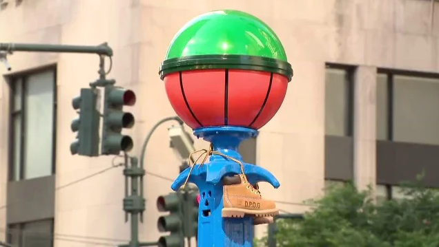 The iconic green lights outside Madison Square Garden have been replaced with basketballs