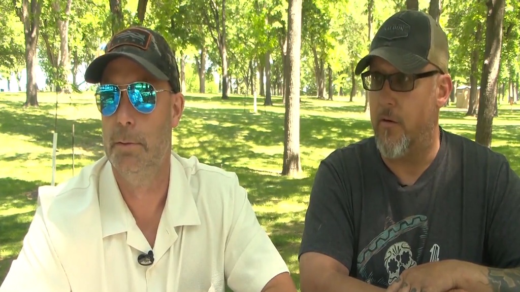 Two men on a Minnesota trail helped rescue a missing woman who had been stuck in the mud for three days.