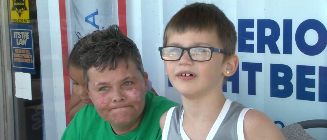 A 7-year-old boy is raising money through a lemonade stand to help a local veteran pay his utility bill while he recovers from surgery.