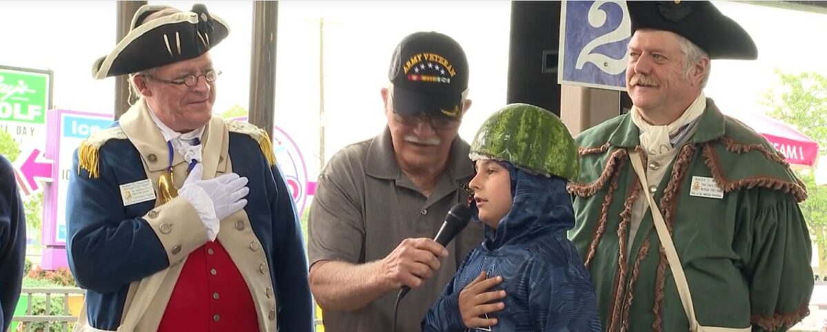 A Fenton ice cream store celebrated Flag Day with a unique challenge: kids who recite the Pledge of Allegiance in front of a crowd win free ice cream and mini-golf tickets.