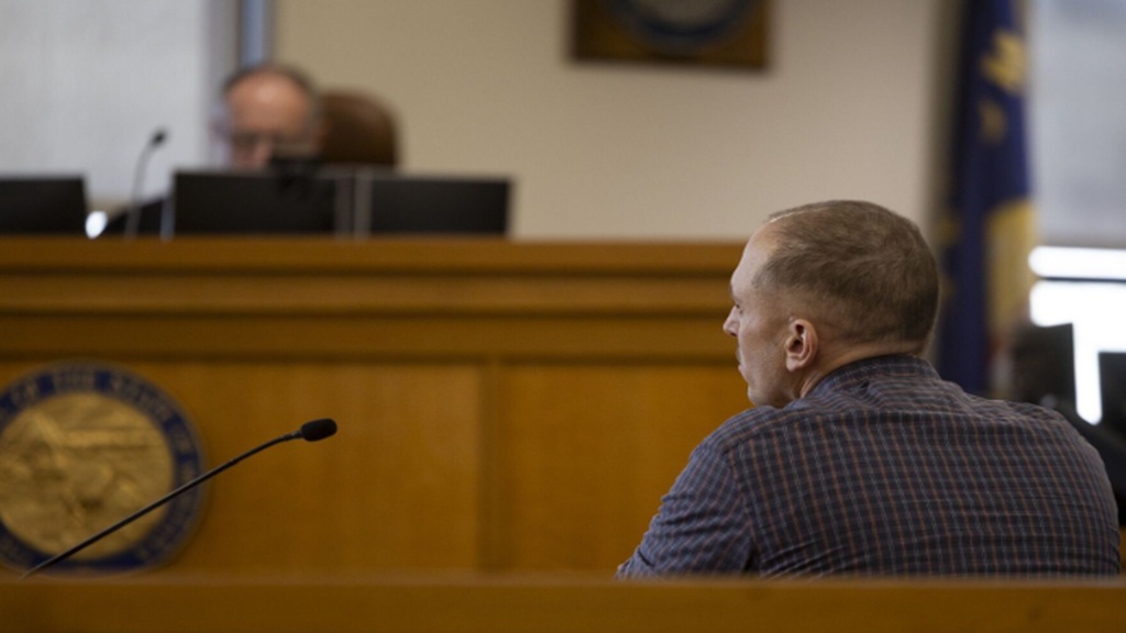 Cody Davis appears in Missoula County District Court on charges of two counts of sexual abuse of children and one count of criminal possession of dangerous drugs on Thursday