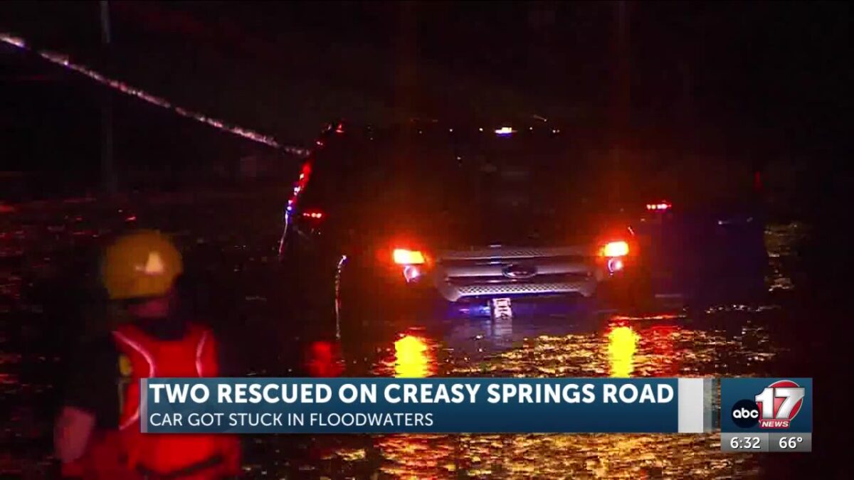 Car trapped in floodwaters on Creasy Springs in Columbia