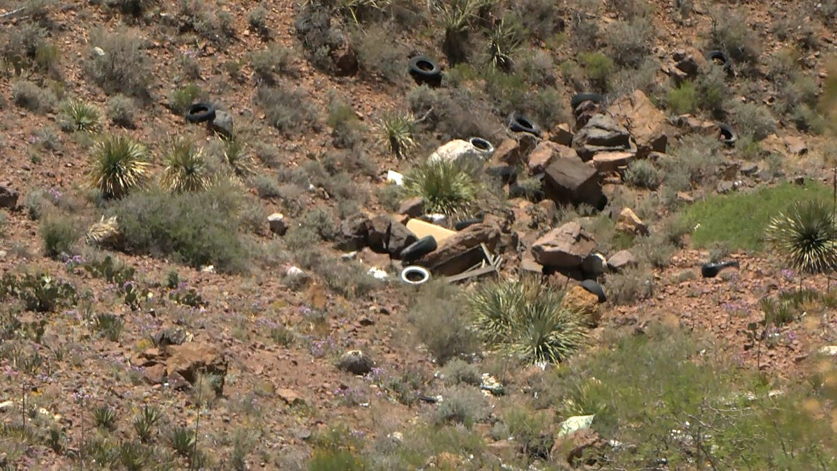 What happens to illegally-dumped trash along Transmountain Road?