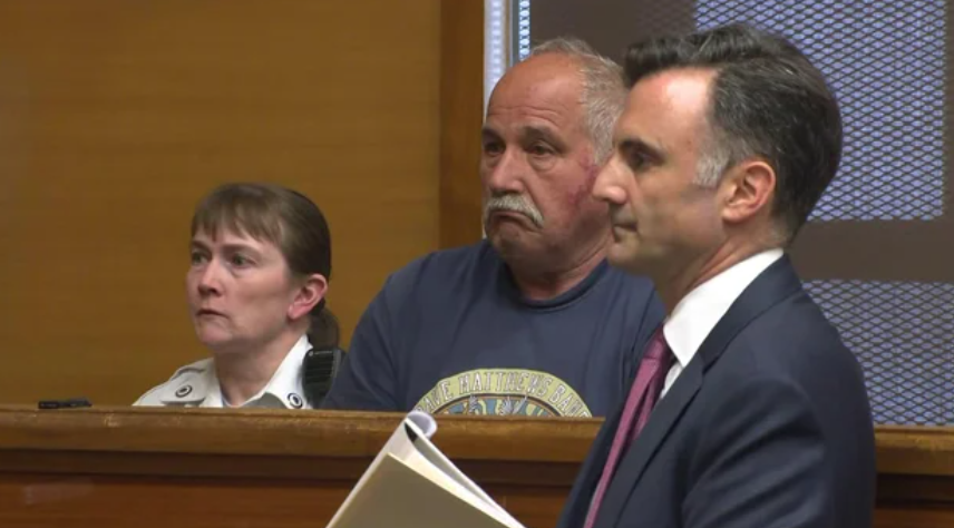 Steven Dana (center) in Framingham District Court on Friday