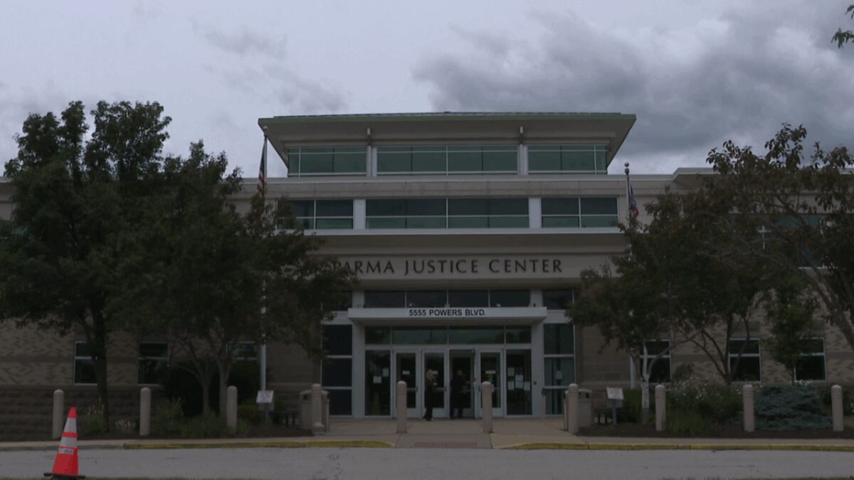 A Parma police officer is on paid administrative leave after allegations he used excessive force against a 13-year-old boy during an incident outside the city's police station last summer.