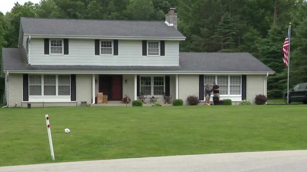 A 25-year-old Delafield man is under arrest after calling 911 and admitting to shooting his father three times during an argument on Father's Day.