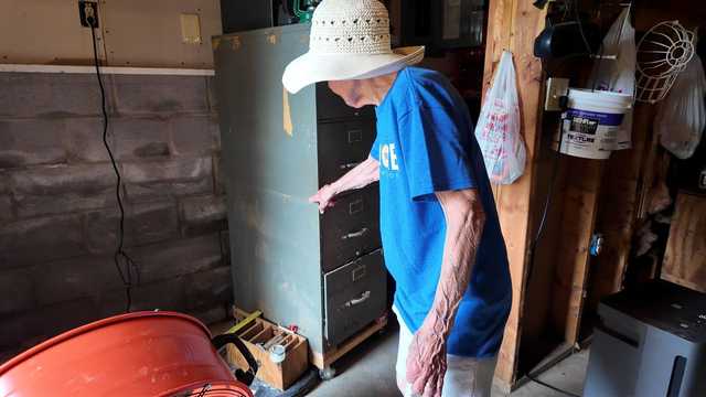 Ruth Price watched as water poured into her basement.