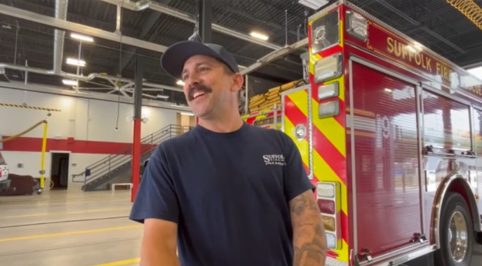 Joshua Baker grabbed his gear from his garage and helped fight a neighbor's house fire before Chesapeake firefighters arrived on scene.