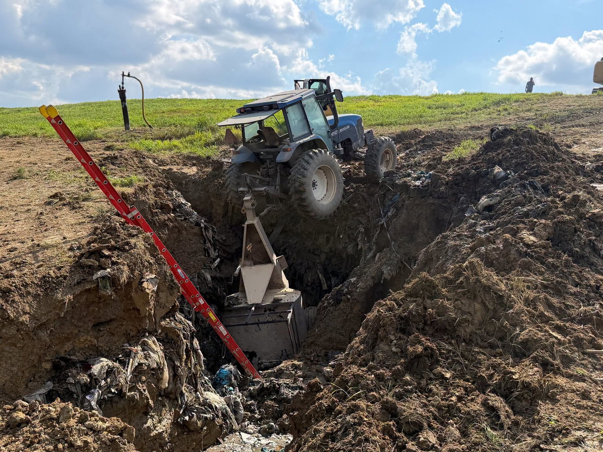 Patient rescued after tractor slides into trench at Columbia landfill