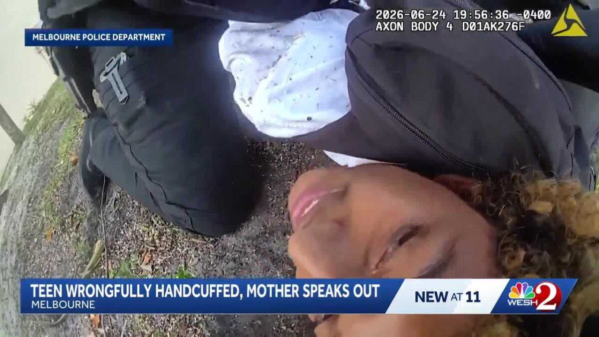Body-camera footage shows Judah on his knees with his hands in the air before an officer took him to the ground and handcuffed him in the area of Eden Park Drive