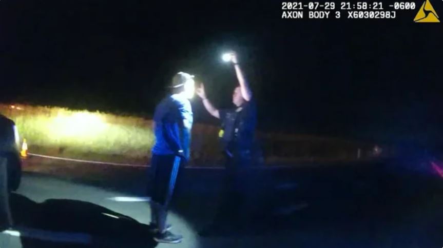 A Nebraska man who stopped to help victims of a devastating motorcycle crash instead found himself handcuffed