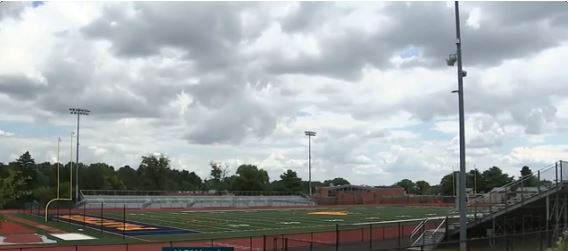 Ten people are facing charges after a 15-year-old Cheltenham High School student was assaulted twice in the locker room last year