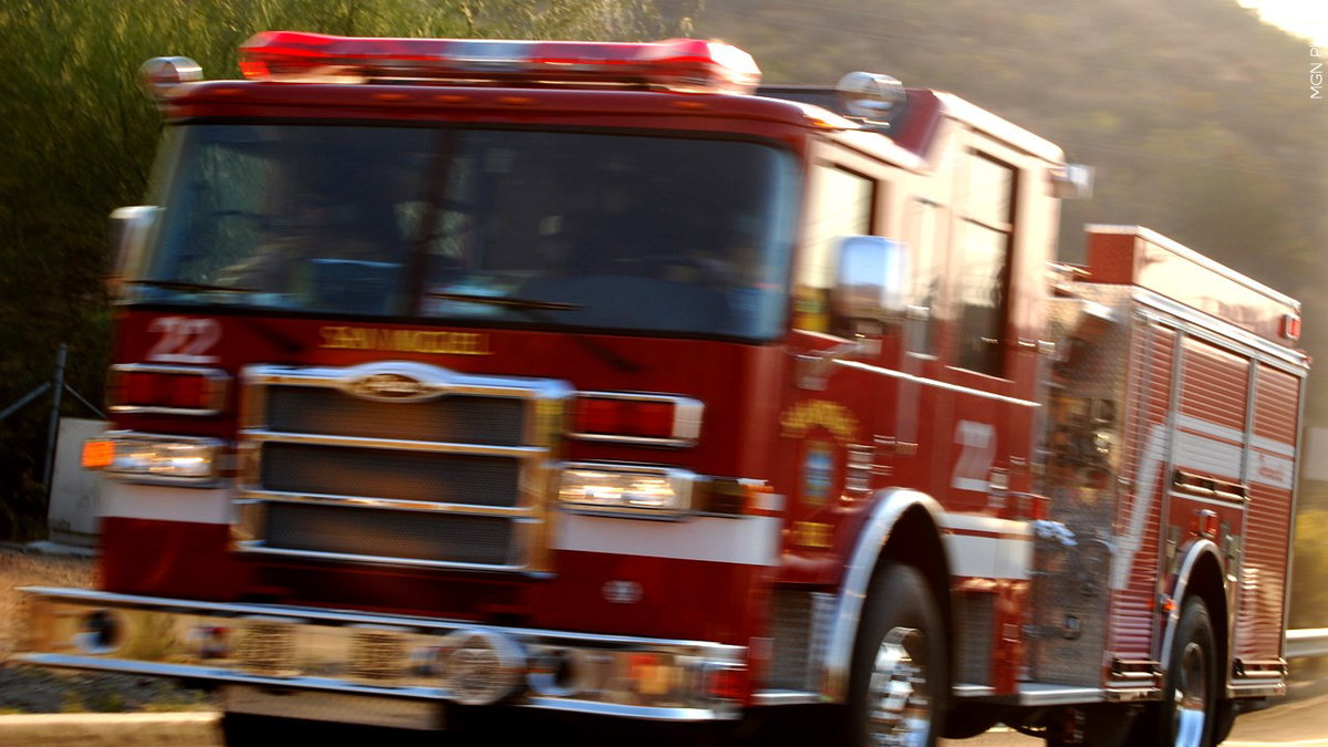Truck fire on I-15 sparks brush fire