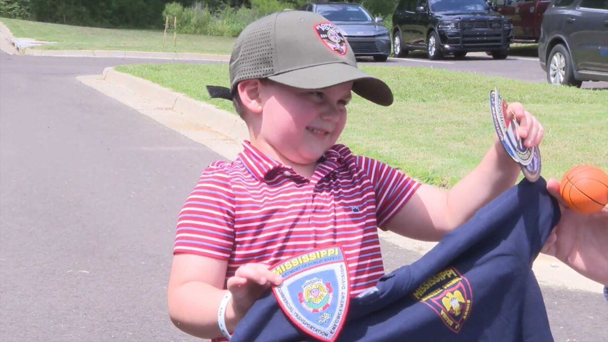 A 4-year-old boy is traveling across the country