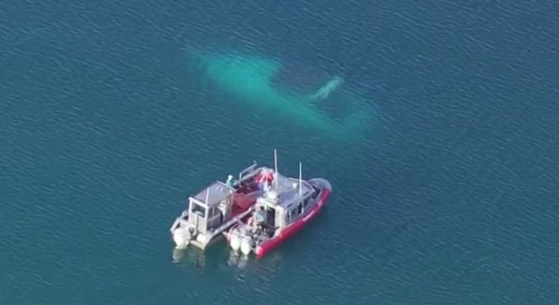 The submerged boat was seen just east of the 31st Street Harbor.