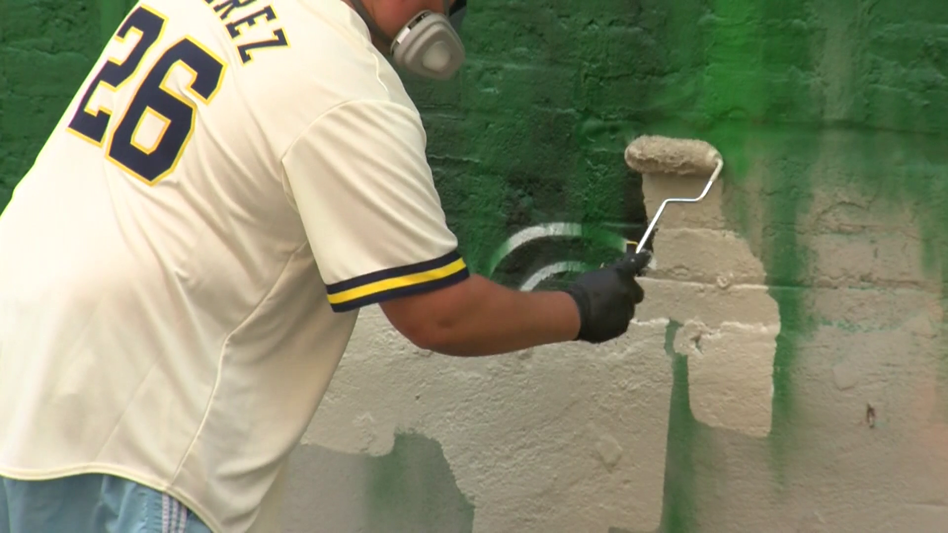 After a call to the mural's original artist