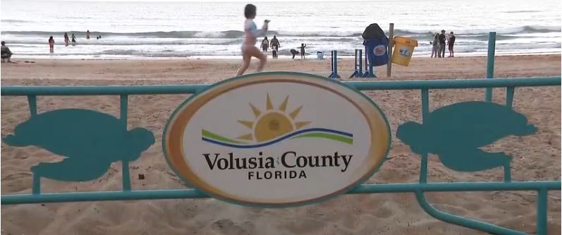 A Volusia County Beach Safety lifeguard who's also a candidate in the Ormond Beach mayoral race was hospitalized after a lightning strike Saturday near the Seminole Approach