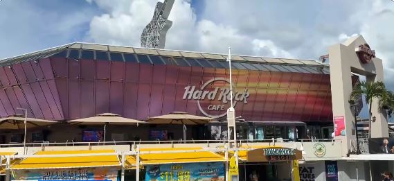 A 21-year-old bartender is speaking out after she was allegedly attacked by a customer while working at the Hard Rock Café at Bayside Marketplace in Miami.