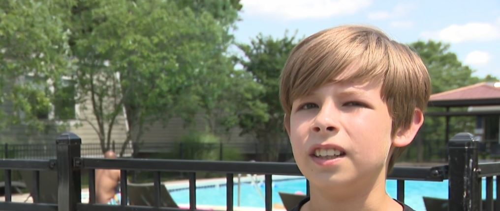 Avory Woolery was outside with his family when he spotted the man face down in the water. Without hesitation