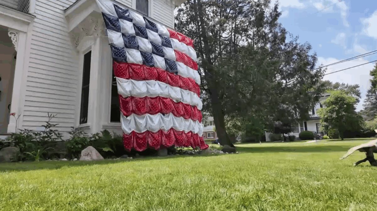 An Oxford family is turning heads — and generating smiles online — with a front yard American flag made entirely out of bandanas
