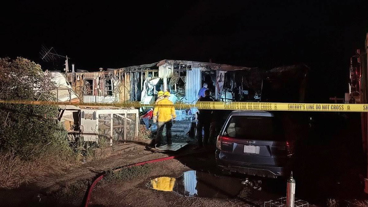 Deputy and neighbor save man trapped in mobile home fire