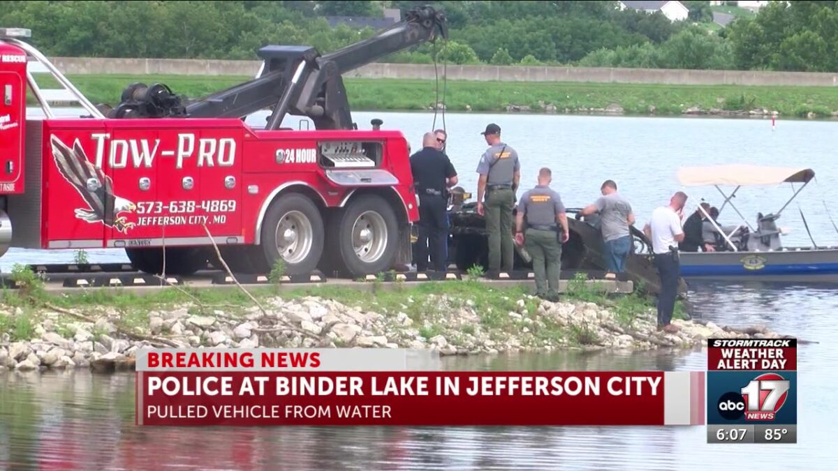 Tow truck pulls out vehicle at Binder Lake