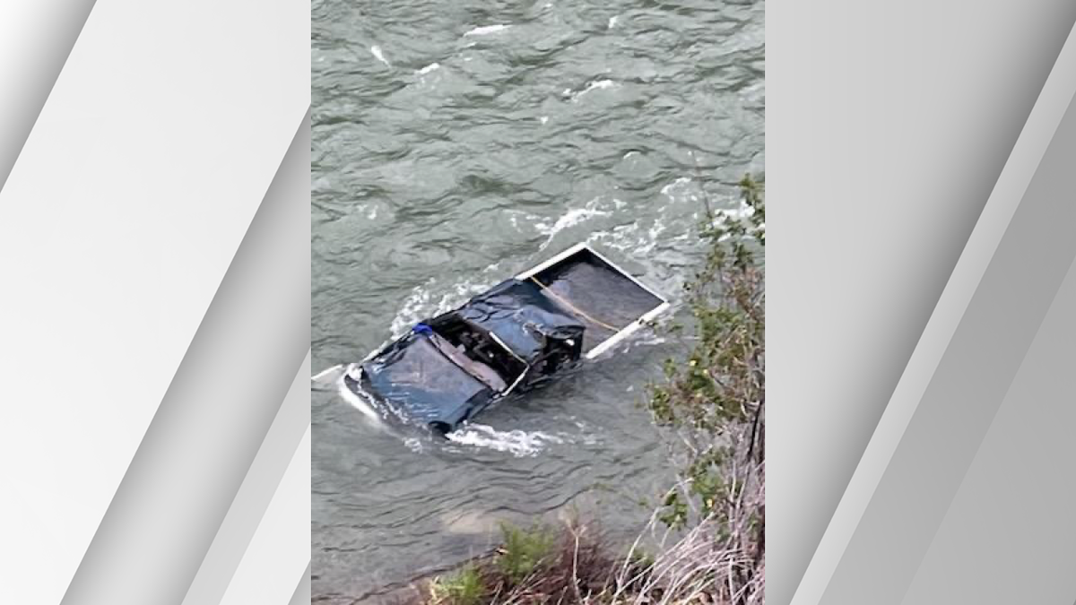 Driver survives after truck rolls into Snake River in Wyoming