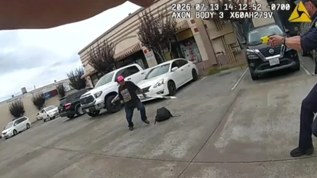 A man swings a homemade spear toward Oakland police and CHP officers just before he is fatally shot