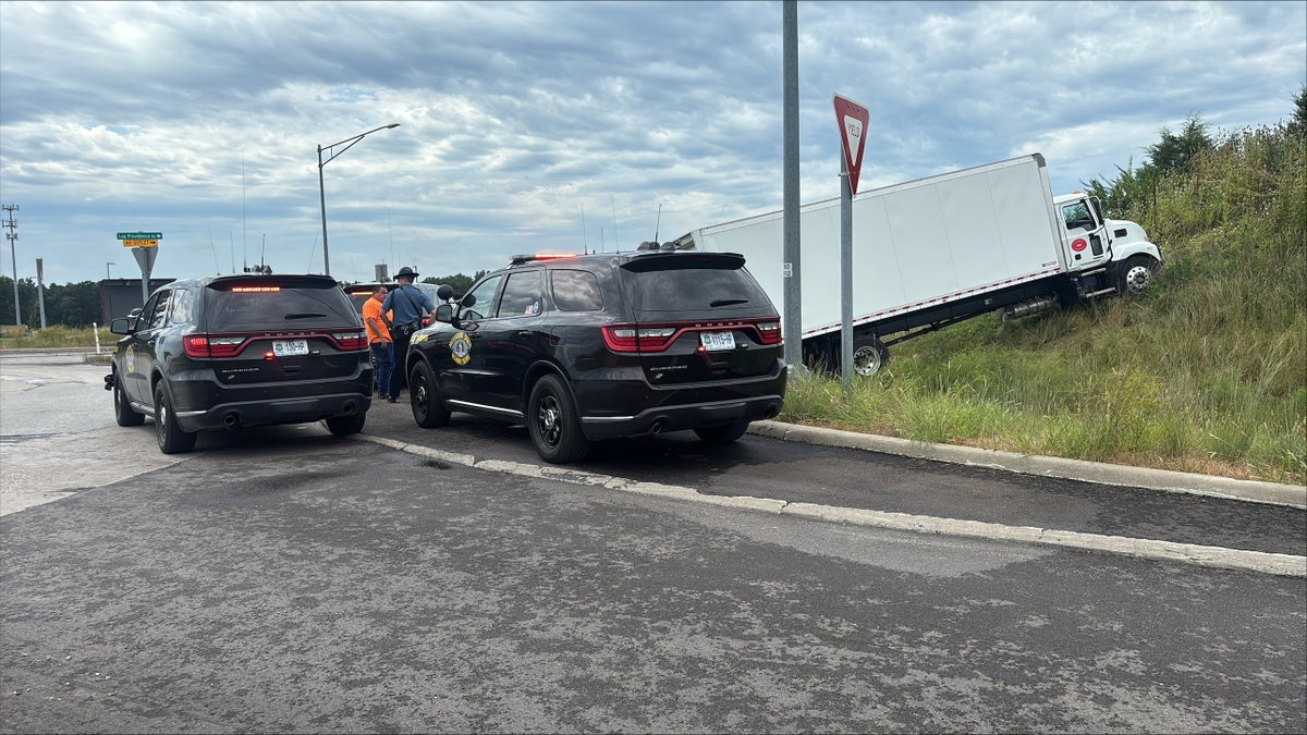 Medical emergency kills driver of box truck hauling for Postal Service