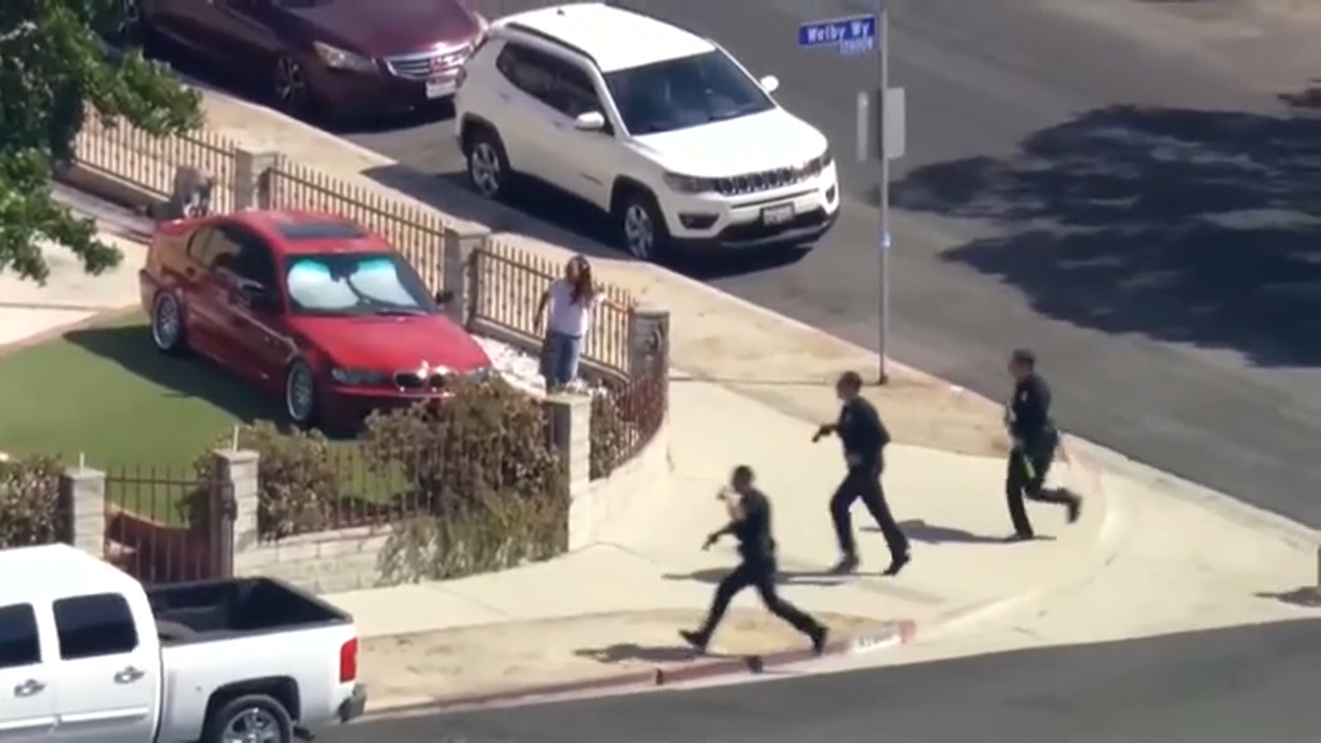 Los Angeles police arrested an alleged robbery suspect following a pursuit and then a foot chase that ended inside a San Fernando Valley home on Friday morning.