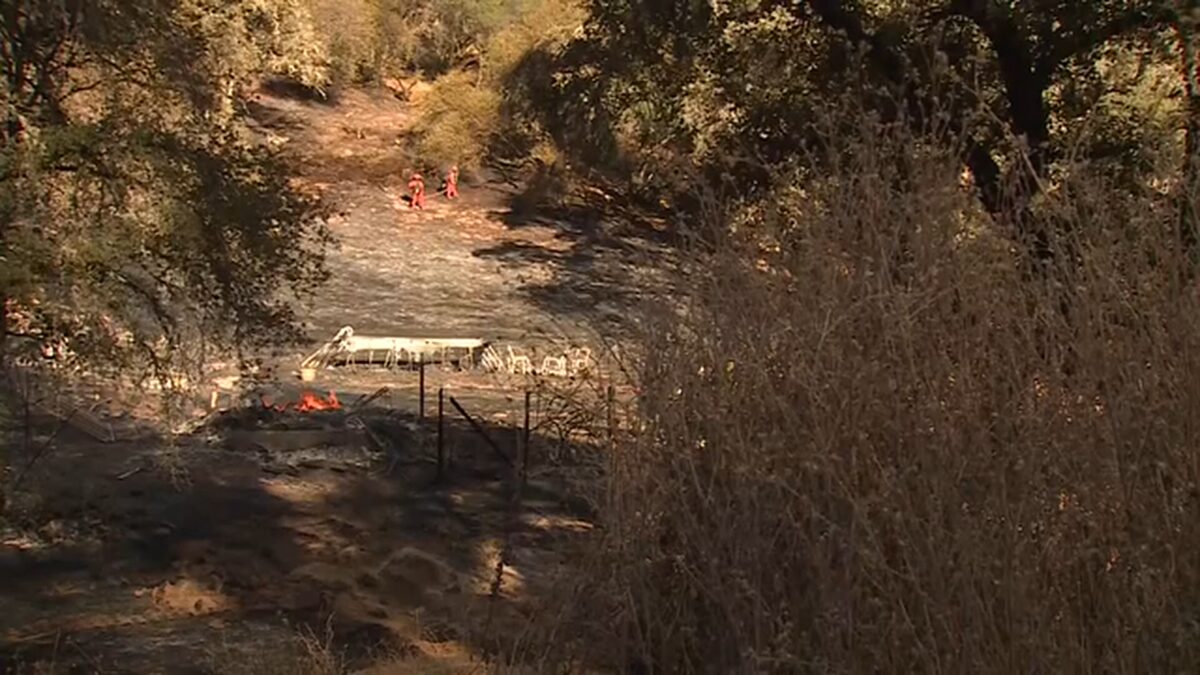 Nevada County Consolidated Fire said it responded to the fire in the area of Clover Valley Road and Fay Drive for a well-involved structure fire that spread to grass around 1:30 p.m.