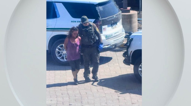 A 47-year-old woman was arrested on suspicion of intentionally starting the Fred Mountain Fire