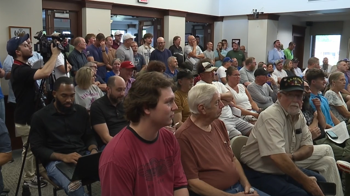 Community members and organizations gathered at a Lexington city council meeting to voice opposition to the city's Flock camera system