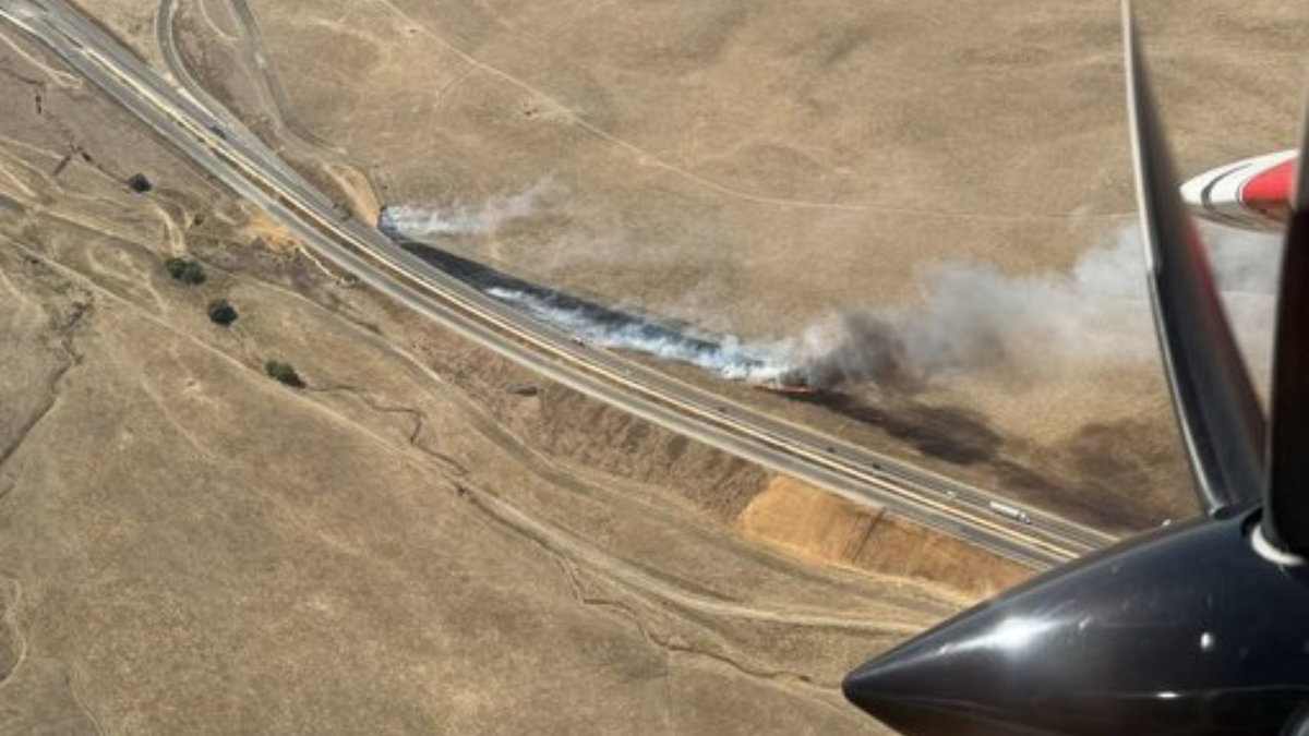 Crews battle 2000-acre grass fire near Highway 46