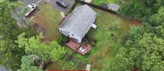 A Plymouth woman was killed by a falling tree while she sat on her porch Monday afternoon. It happened as storms bringing high winds and flooding downpours rolled through Massachusetts.