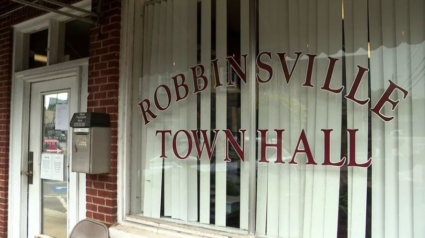 The Robbinsville Board of Aldermen has accepted Mayor Shaun Adams' decision to take a three-month leave of absence following his arrest on Monday
