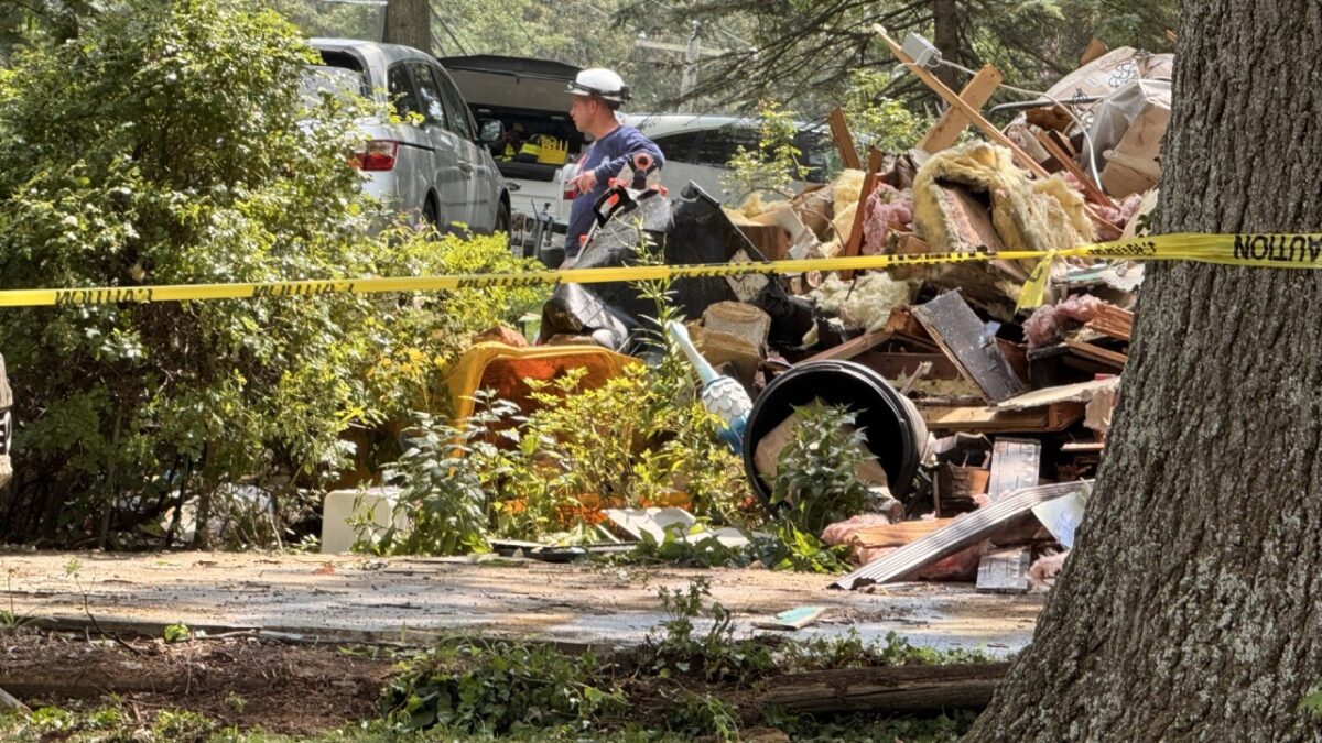 Joseph and Benjamin Toms were visiting their father's home when a massive explosion collapsed their neighbor's house. The brothers rushed over without hesitation