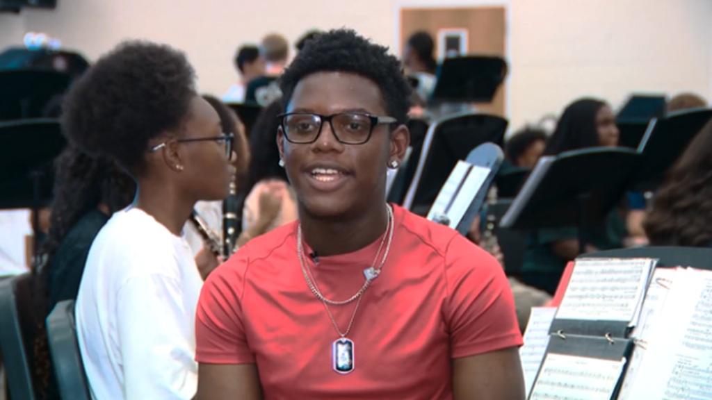 Junior Rylan Kleckley leads Woodland High School's award-winning marching band as drum major.