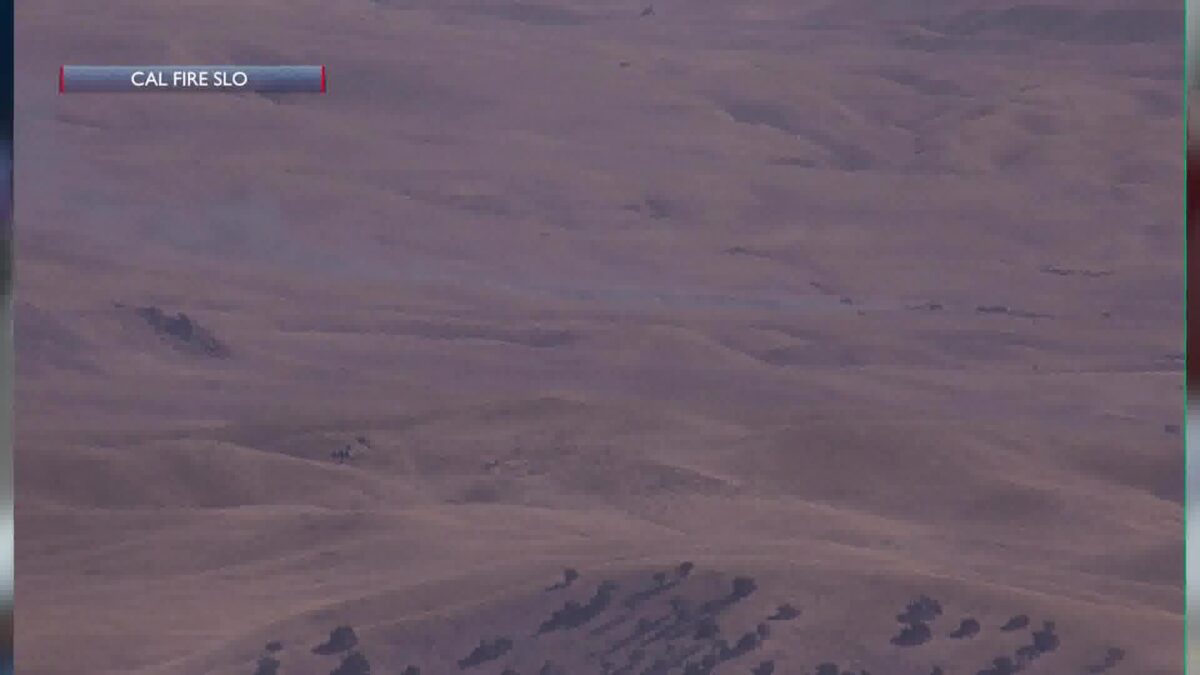 Crews battle 2410-acre grass fire near Highway 46