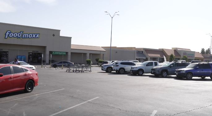 Authorities are searching for the driver of a pickup truck who struck a mother selling elotes near a FoodMaxx parking lot and fled the scene without stopping to help.