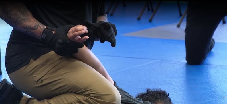 Some school resource officers in Omaha-area school districts are using shock gloves to manage dangerous situations
