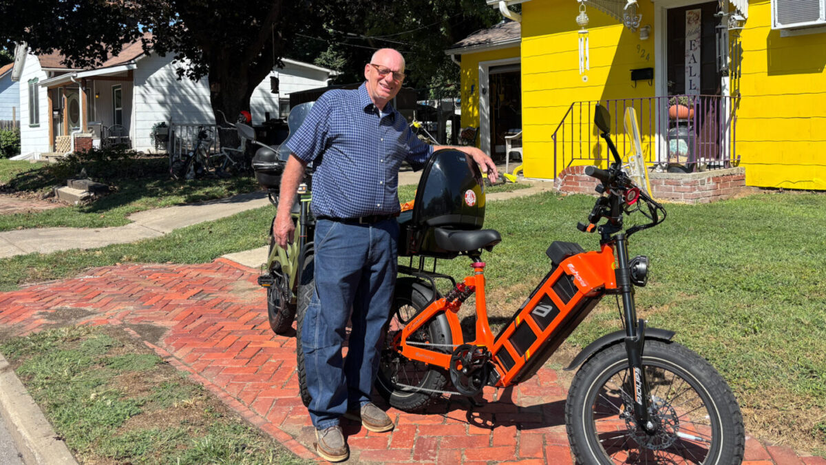 Johnnie Winslow posing with his bike "Juliet".