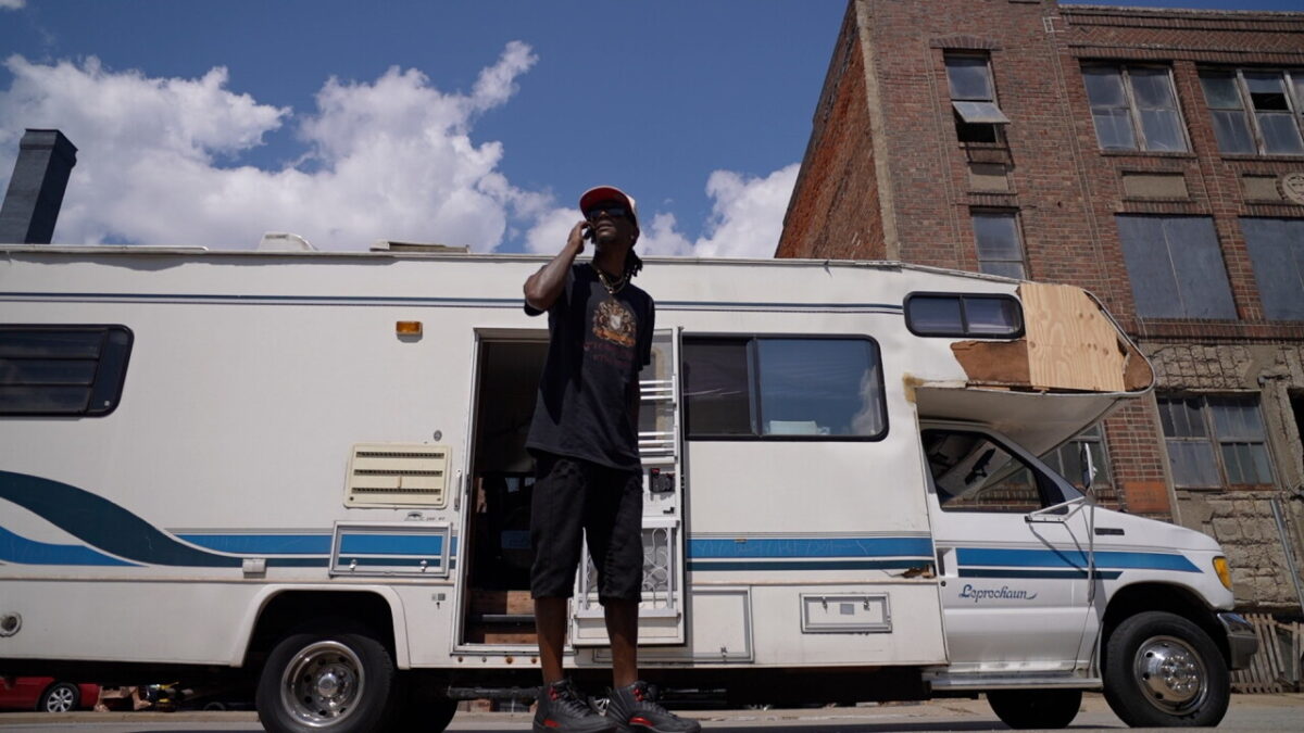 Darren Gamble stands outside his RV Downtown